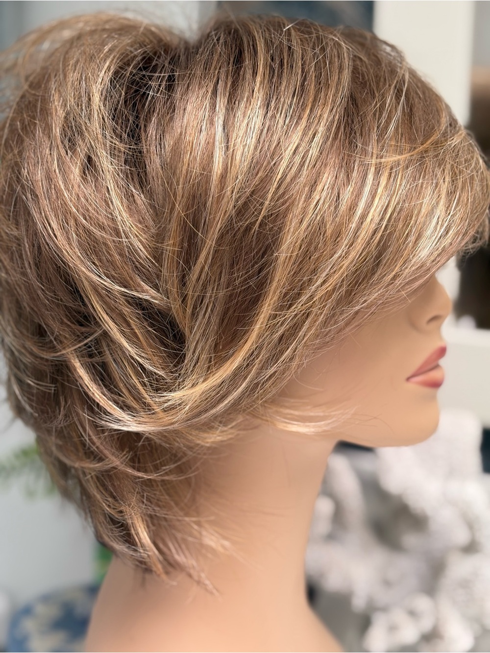 Freedom in Mochaccino LARGE wig fits 23” circumference.